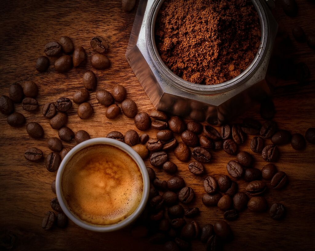 An Exploration to Batam Coffee Culture 3 brown coffee beans beside white ceramic mug