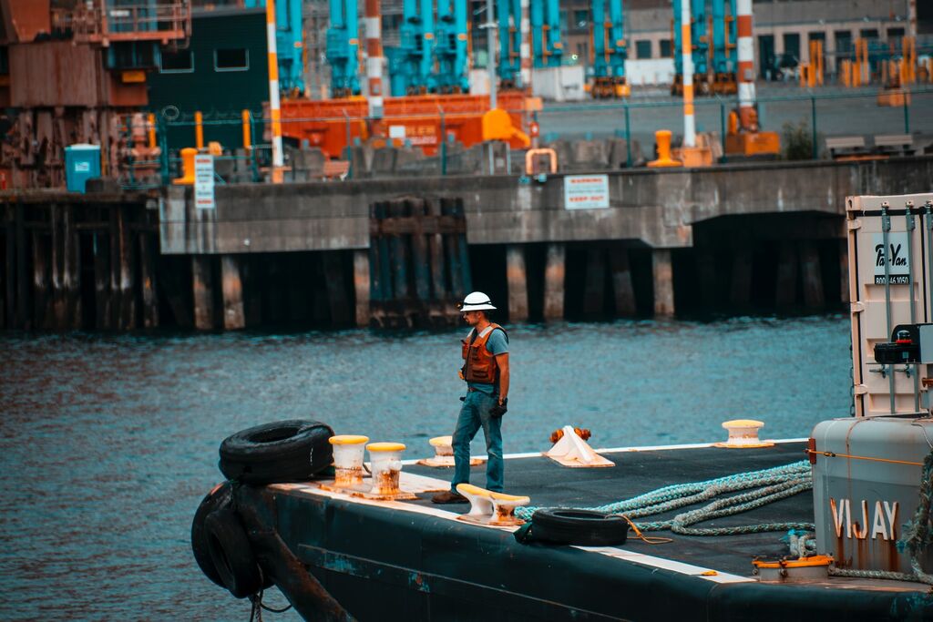 Compliance Check: Demystifying Port State Control (PSC) Inspections in the Maritime Sector 8 man standing on sailboat